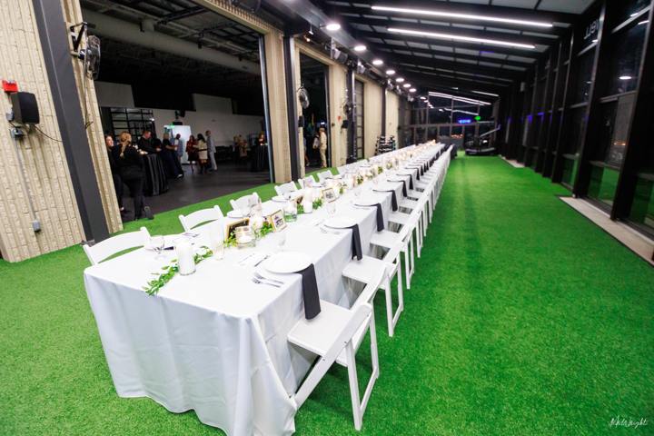 Event dinner set up on the turf